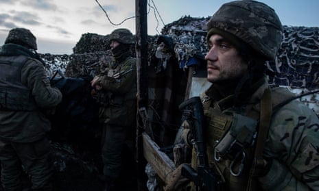 Ukrainian soldiers at the frontline with Russian-backed forces in the Donbas, as pictured in the original report