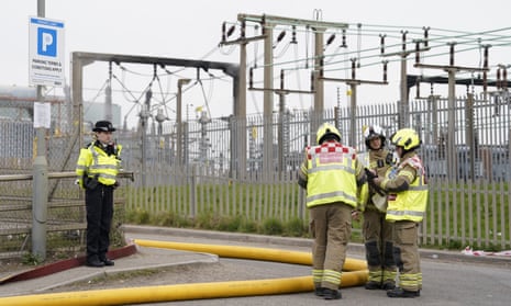 Police and firefighters at the North Hyde substation in the selected March 2025 Guardian report
